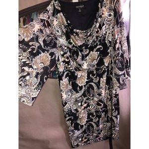 Patterned dress with sheer sleeves